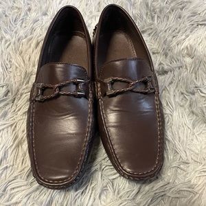 Brown pair of men’s slip on loafers. Lightly worn.